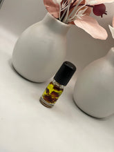 Load image into Gallery viewer, Travel-size vegan jojoba oil with rose petals