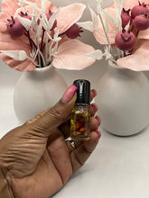 Load image into Gallery viewer, Cold-pressed jojoba oil with rose petals