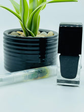 Load image into Gallery viewer, Glossy black vegan polish on hand