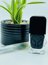 Load image into Gallery viewer, Glossy black vegan gel polish on hand